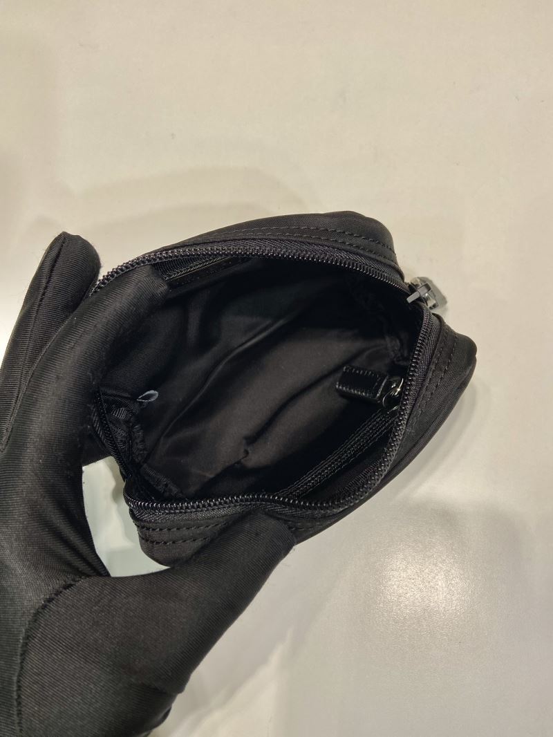 Pra*a clutch bags